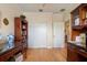 Spacious home office with built-in shelving and a traditional style desk at 4709 Fox St, Orlando, FL 32814