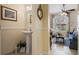 Stylish powder room with pedestal sink and decorative mirror, located near the living room at 4709 Fox St, Orlando, FL 32814