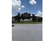The Retreat at Wekiva community entrance sign surrounded by lush landscaping at 5040 Rock Rose Loop, Sanford, FL 32771