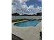 Backyard pool and spa area enclosed by a white fence for privacy and security at 5040 Rock Rose Loop, Sanford, FL 32771