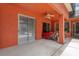 Covered patio with ceiling fan and sliding glass doors, providing outdoor living space at 5306 Crane Hill Ct, St Cloud, FL 34771