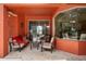 Cozy covered patio with comfortable seating, perfect for relaxing and enjoying the outdoors at 5306 Crane Hill Ct, St Cloud, FL 34771