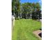 Spacious backyard with lush green lawn and beautiful lake views at 5416 Bay Side Dr, Orlando, FL 32819