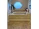 Elegant bathroom with a large soaking tub and decorative window at 5416 Bay Side Dr, Orlando, FL 32819