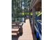 Well-maintained dock featuring a covered boat lift and bench seating, perfect for enjoying the waterfront view at 5416 Bay Side Dr, Orlando, FL 32819