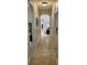 Inviting hallway showcasing tiled flooring leading to bright, airy living spaces at 5416 Bay Side Dr, Orlando, FL 32819