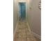 Hallway view featuring tile floors leading to other rooms in the house at 5416 Bay Side Dr, Orlando, FL 32819