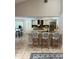 Well-designed kitchen featuring a large island with counter seating and stainless steel appliances at 5416 Bay Side Dr, Orlando, FL 32819