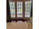 Bedroom access to lanai with view of pool, outdoor seating, and lake at 5416 Bay Side Dr, Orlando, FL 32819