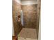 Modern bathroom with a glass enclosed walk-in shower featuring decorative tile at 5416 Bay Side Dr, Orlando, FL 32819