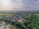 A charming neighborhood nestled among lush greenery, offering a serene and picturesque setting from an aerial viewpoint at 544 Lake Sumner Dr, Groveland, FL 34736