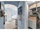 Hallway view into Primary bathroom featuring soaking tub and walk in closet at 544 Lake Sumner Dr, Groveland, FL 34736