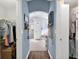 Hallway view into Primary bathroom featuring soaking tub and a walk in shower at 544 Lake Sumner Dr, Groveland, FL 34736