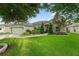 Inviting single-Gathering home with a well-maintained lawn and front garden at 544 Lake Sumner Dr, Groveland, FL 34736