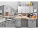 Well appointed kitchen with stainless steel appliances and ample cabinet space at 544 Lake Sumner Dr, Groveland, FL 34736