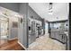 Updated kitchen with stainless steel appliances, pendant lighting and gray cabinetry at 544 Lake Sumner Dr, Groveland, FL 34736
