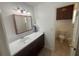 Bathroom with vanity and toilet alcove offering additional space at 5935 Sheryl Anita St, Oviedo, FL 32765