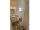 Cozy bathroom with classic vanity and compact design at 5935 Sheryl Anita St, Oviedo, FL 32765