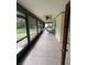 Spacious screened-in porch overlooking the landscaped backyard at 5935 Sheryl Anita St, Oviedo, FL 32765