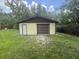 Detached shed with roll up door and side door at 5935 Sheryl Anita St, Oviedo, FL 32765