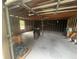 Interior of the shed featuring concrete floors, exposed studs and ceiling, window, and ample storage space at 5935 Sheryl Anita St, Oviedo, FL 32765
