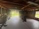 Shed interior shows studs and supports for interior and window to exterior at 5935 Sheryl Anita St, Oviedo, FL 32765