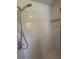 All-white tiled stand-up shower is easy to clean and functional at 5935 Sheryl Anita St, Oviedo, FL 32765