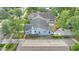 Home aerial view showcases the backyard, roof, and landscaping within the neighborhood context at 638 Clayton St, Orlando, FL 32804