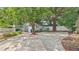 Private backyard featuring a spacious patio area and a detached garage at 638 Clayton St, Orlando, FL 32804