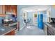 Stylish kitchen with retro refrigerator, custom cabinets and stainless steel appliances at 638 Clayton St, Orlando, FL 32804