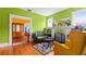 Cozy living room featuring colorful walls, hardwood floors, and a decorative fireplace at 638 Clayton St, Orlando, FL 32804