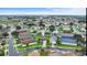 An overhead view of this charming community showcases well-maintained lawns and inviting pools at 8102 Pomo Dr, Kissimmee, FL 34747