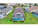 Aerial view of the home showcasing its large pool and backyard at 8102 Pomo Dr, Kissimmee, FL 34747