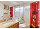 Bathroom with shower and Mickey Mouse decorations at 8102 Pomo Dr, Kissimmee, FL 34747