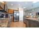 Spacious kitchen offers stainless steel appliances and an open layout for seamless cooking and entertaining at 8102 Pomo Dr, Kissimmee, FL 34747