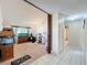 Versatile bonus room with carpet, large windows, and direct access to the main hallway at 8346 Mattituck Cir, Orlando, FL 32829
