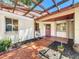 Charming entrance featuring a brick pathway and garden at 8346 Mattituck Cir, Orlando, FL 32829