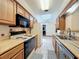 Efficient kitchen with ample counter space and modern appliances at 8346 Mattituck Cir, Orlando, FL 32829