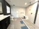 Modern bathroom with sleek vanity and spacious, glass-enclosed shower at 9148 Oakwood Dr, Lake Wales, FL 33898
