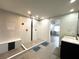Modern bathroom with sleek vanity and spacious, glass-enclosed shower at 9148 Oakwood Dr, Lake Wales, FL 33898
