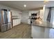 Spacious kitchen with stainless steel appliances, granite countertops, and ample storage at 9148 Oakwood Dr, Lake Wales, FL 33898
