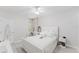 Inviting bedroom with desk and light-colored vinyl floors for a serene feel at 9285 Wickham Way, Orlando, FL 32836