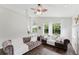 Open-concept living room with high ceilings and lots of natural light at 9285 Wickham Way, Orlando, FL 32836