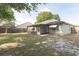 Back exterior of home with screened in patio and privacy fence at 1005 Black Willow Dr, Oviedo, FL 32765