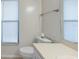 Bathroom featuring a vanity and toilet by the window at 1005 Black Willow Dr, Oviedo, FL 32765