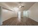 Spacious living room with plenty of natural light, featuring wood-look floors and neutral walls at 1005 Black Willow Dr, Oviedo, FL 32765