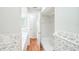Bathroom featuring a tiled shower and single sink vanity with marbled accents at 111 Tarrytown Trl, Longwood, FL 32750