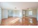 Open living room featuring tiled flooring, ample natural light, and a neutral color palette at 111 Tarrytown Trl, Longwood, FL 32750