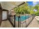 Fenced pool area, with a covered patio for comfortable outdoor living at 111 Tarrytown Trl, Longwood, FL 32750