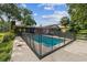 Beautiful backyard featuring a private pool enclosed by a safety fence and patio at 111 Tarrytown Trl, Longwood, FL 32750
